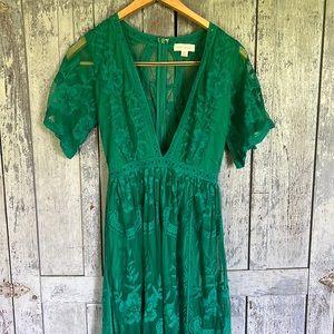 Emerald Green Honey Punch Dress with Romper. Deep v-neck. Lace flutter sleeve